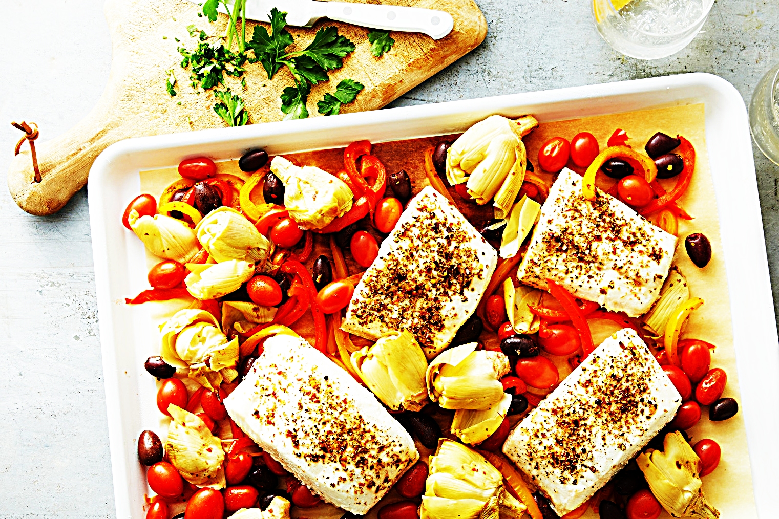 Stupid-Easy Recipe for Sheet-Pan Halibut with Mediterranean Vegetables (#1 Top-Rated)