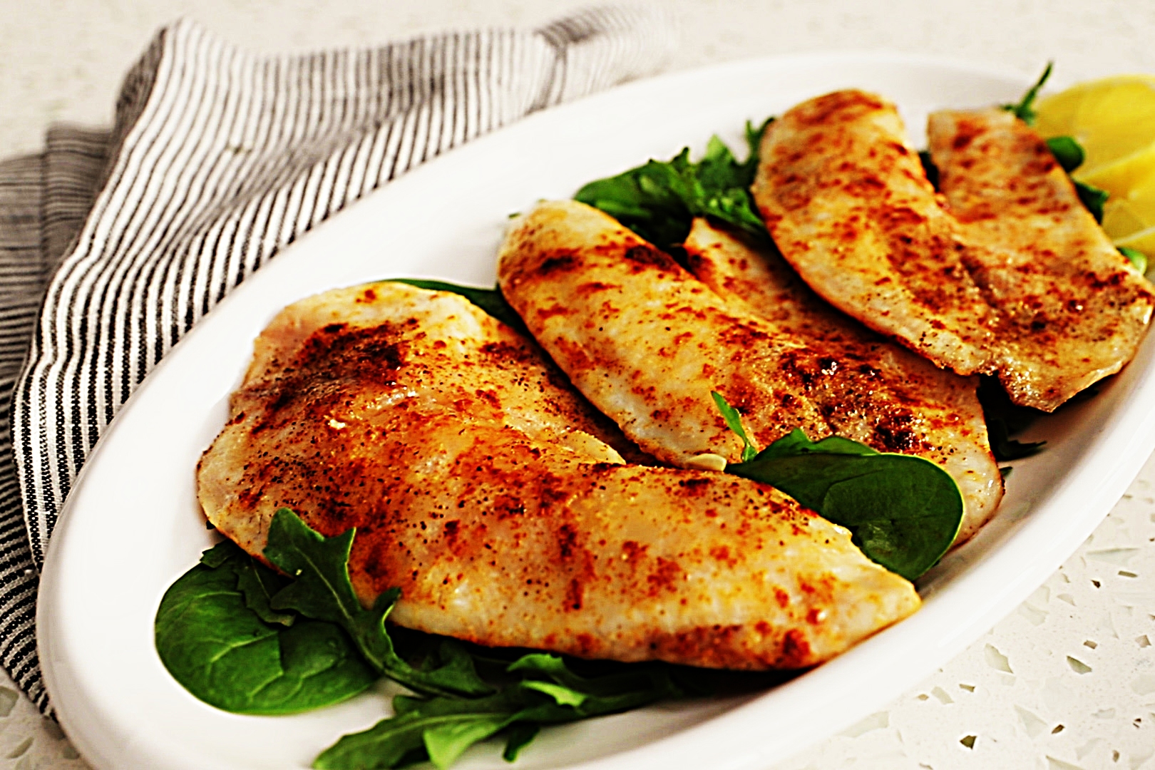 Stupid-Easy Recipe for Reduced-Fat Baked Tilapia (#1 Top-Rated)