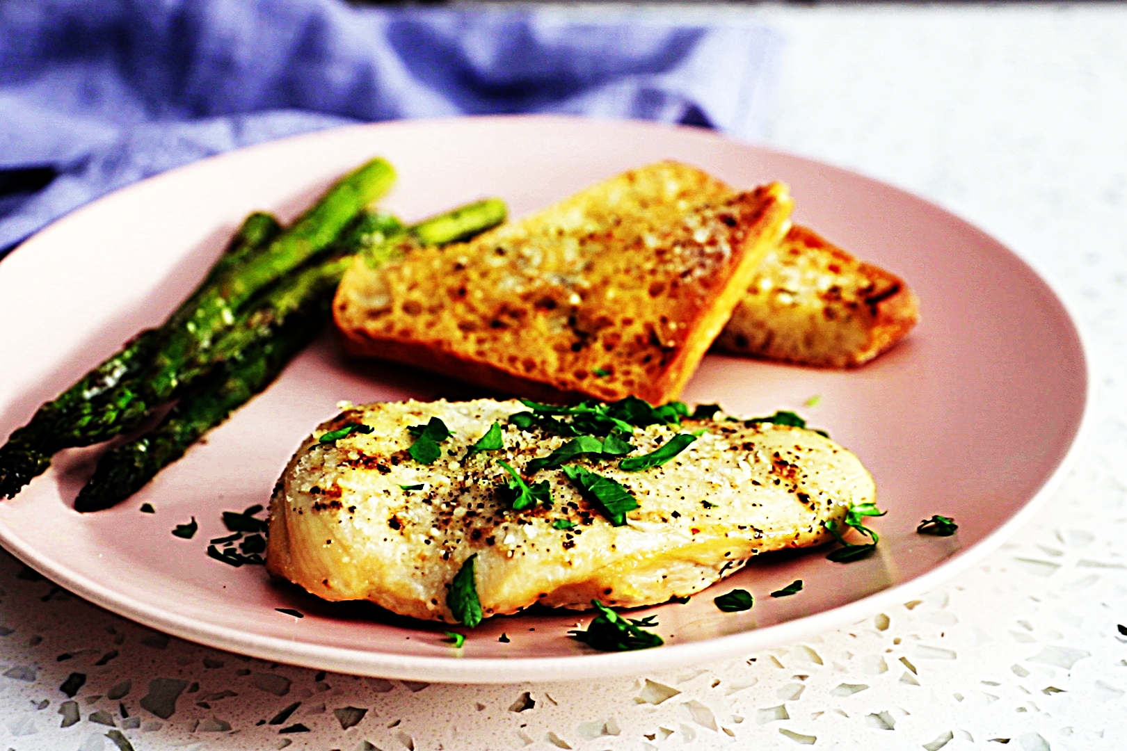 Stupid-Easy Recipe for Sheet Pan Caesar Chicken and Asparagus with Garlic Bread (#1 Top-Rated)
